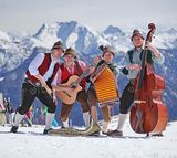 Musicians on the mountain in winter